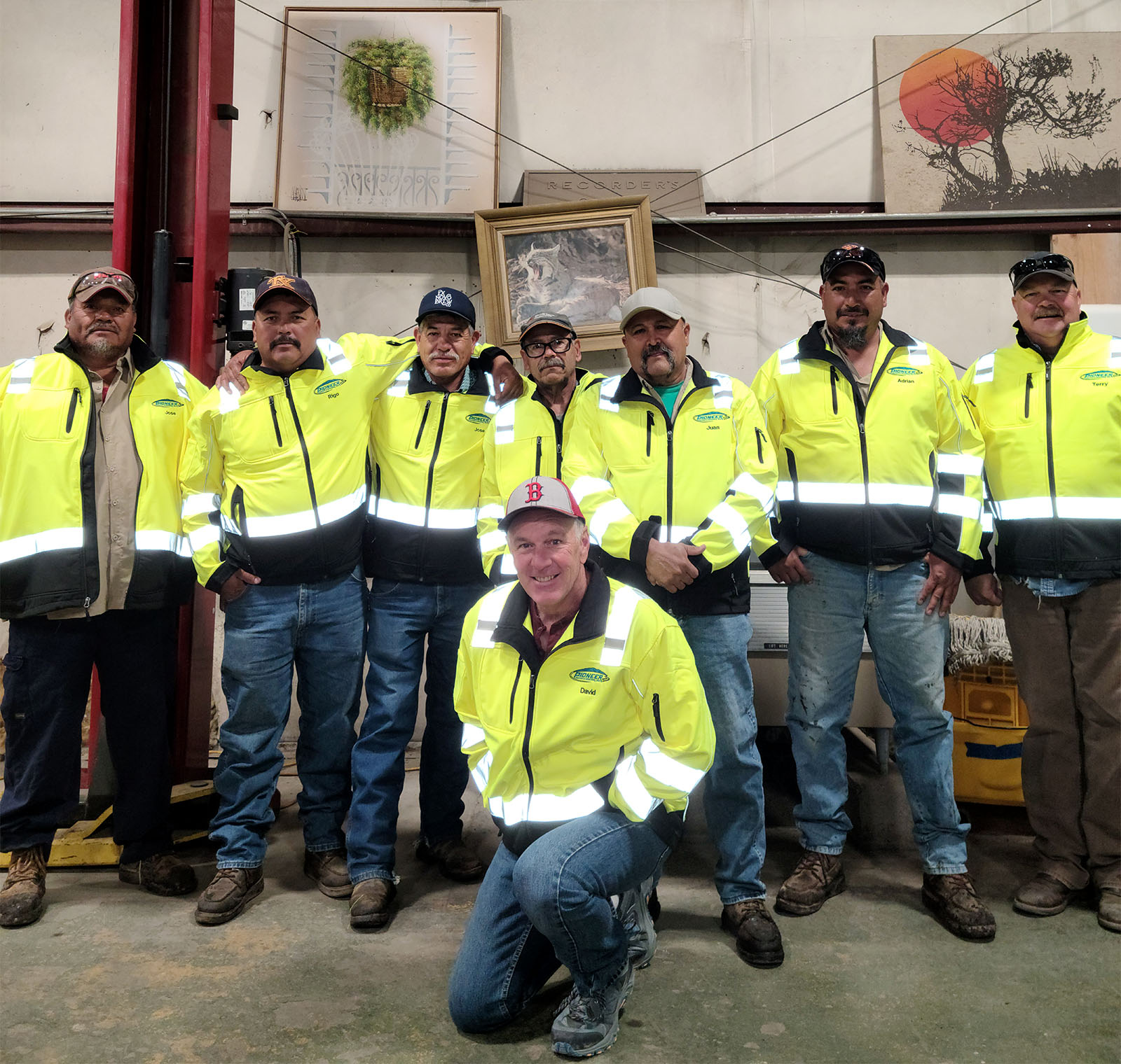 The Pioneer Paving team in matching high-visibility jackets